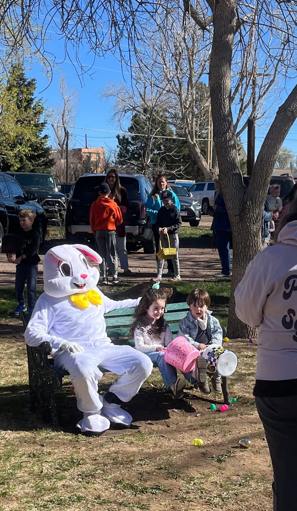 The Easter Bunny with kids at the Palmer Lake Easter Egg Hunt