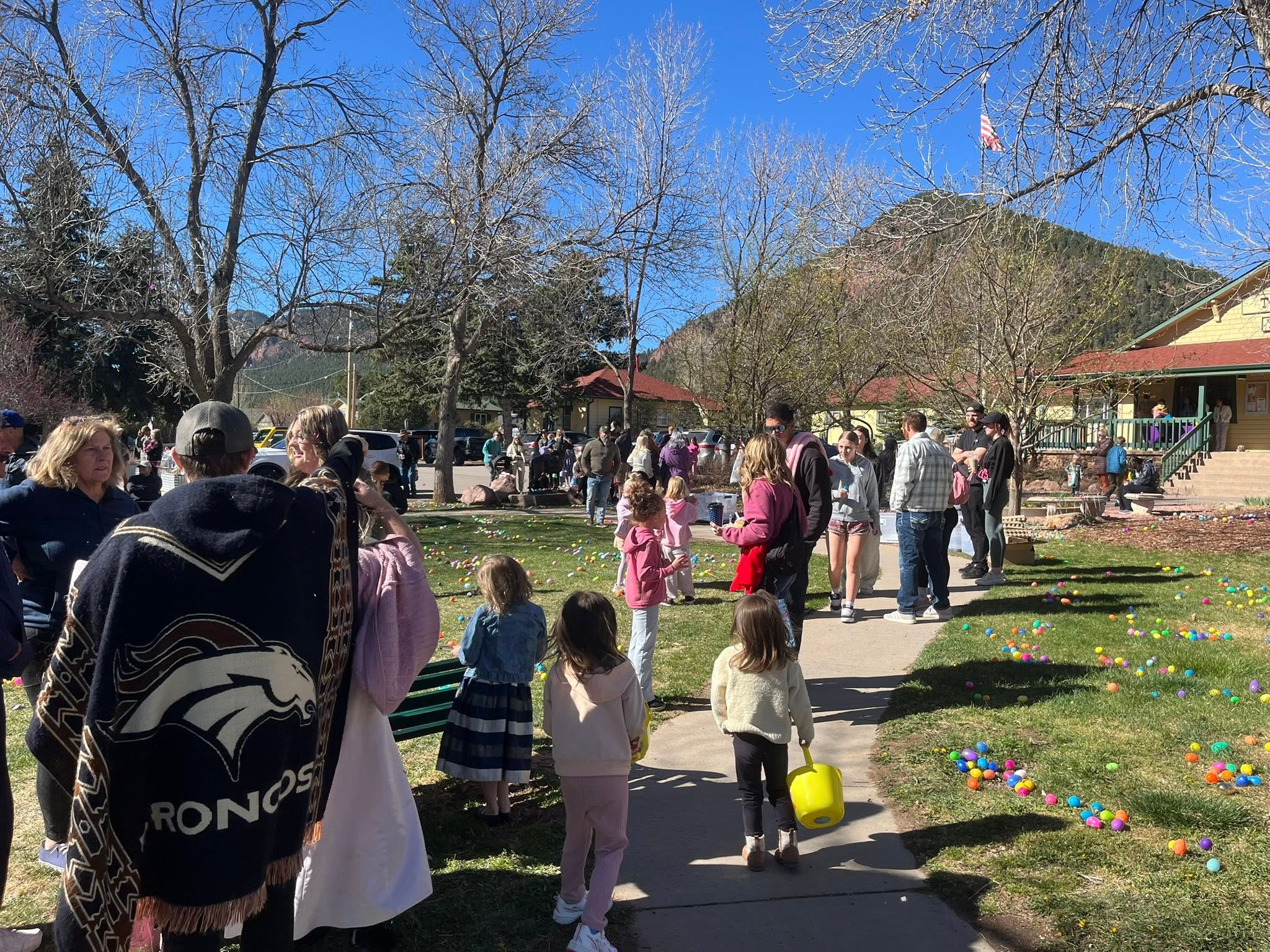 Families gathered on the Village Green for the Palmer Lake Easter Egg Hunt